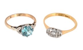 A 1950S DIAMOND RING AND A BLUE ZIRCON RING