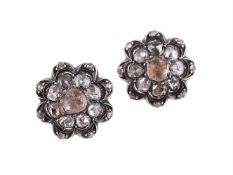 A PAIR OF DIAMOND FLOWERHEAD EARRINGS