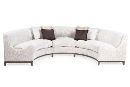 A CUT VELVET AND WENGE CURVED WINDOW SEAT, OF RECENT MANUFACTURE