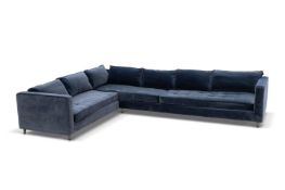 A LARGE DARK BLUE UPHOLSTERED CORNER SOFA, OF RECENT MANUFACTURE