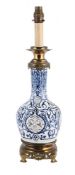 A FRENCH GILT METAL MOUNTED BLUE AND WHITE POTTERY TABLE LAMP, LATE 19TH CENTURY
