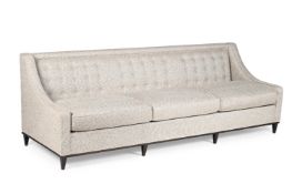 A CREAM AND BROWN UPHOLSTERED THREE SEAT SOFA, OF RECENT MANUFACTURE