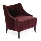 A BURGUNDY VELVET UPHOLSTERED ARMCHAIR, OF RECENT MANUFACTURE