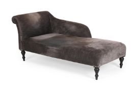 A CHENILLE UPHOLSTERED AND EBONISED CHAISE LONGUE, OF RECENT MANUFACTURE