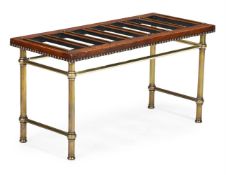 A LEATHER AND TUBULAR BRASS LUGGAGE RACK, OF RECENT MANUFACTURE