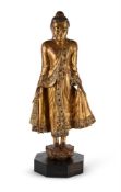 A BURMESE GILDED AND LACQUERED WOODEN FIGURE OF BUDDHA, 20TH CENTURY