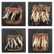 Y A SET OF FOUR WOVEN BAGS IN PERSPEX FRAMES, MODERN