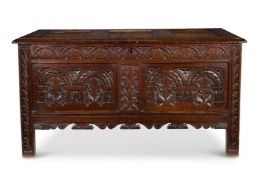 A CHARLES II OAK COFFER, MID 17TH CENTURY