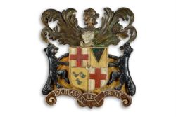 A GEORGE I POLYCHROME, PARCEL GILT, AND STAINED CARVED OAK ARMORIAL, FIRST QUARTER 18TH CENTURY