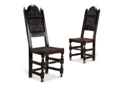 A PAIR OF CARVED OAK BACKSTOOLS SOUTH LANCASHIRE, LATE 17TH/EARLY 18TH CENTURY