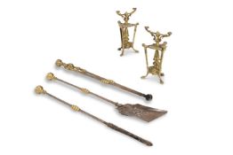A SET OF BRASS MOUNTED STEEL FIRE IRONS, 20TH CENTURY