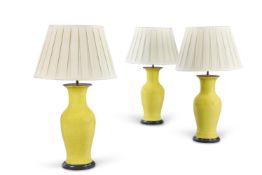 A SET OF THREE CHINESE STYLE YELLOW CRACKLE GLAZE LAMP BASES, MODERN