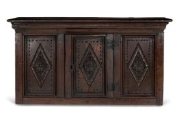 A CARVED OAK HANGING CABINET ENGLISH, LATE 17TH CENTURY