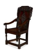 A CHARLES II CARVED OAK JOINED ARMCHAIR NOTHERN ENGLAND, MID 17TH CENTURY