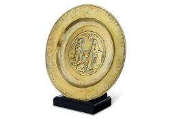 A NUREMBERG BRASS 'ANNUNCIATION' ALMS, EARLY 16TH CENTURY