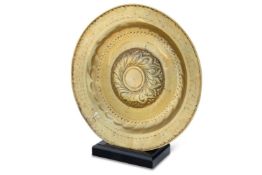 A NUREMBERG BRASS ALMS DISH, 16TH/17TH CENTURY