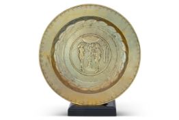 A NUREMBERG BRASS 'ADAM AND EVE' ALMS DISH, 16TH CENTURY