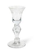 AN ENGRAVED BALUSTER WINE GLASS, CIRCA 1740