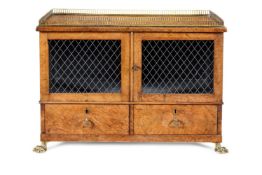 A REGENCY GILT-BRASS MOUNTED MAPLE TABLE CABINET, CIRCA 1815
