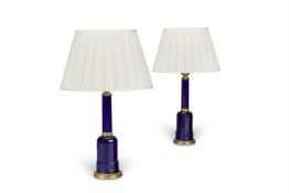 A PAIR OF BRASS MOUNTED BLUE GLASS LAMP BASES, MODERN