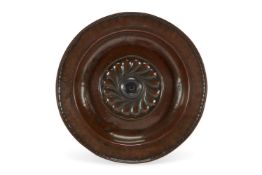 A NUREMBERG BRONZED BRASS ALMS DISH, 16TH/17TH CENTURY