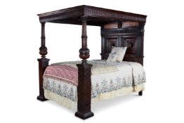 AN ENGLISH OAK, WALNUT AND MARQUETRY TESTER BEDSTEAD, EARLY 17TH CENTURY
