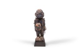 A YORUBA SHRINE FIGURE