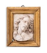 ATTRIBUTED TO MICHIEL FABRIS, CALLED L'ONGARO, A MARBLE RELIEF WITH THE HEAD OF CHRIST