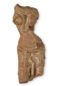 A RED SANDSTONE TORSO OF A DEVATA INDIAN, 10TH/11TH CENTURY