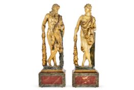 A PAIR OF POLYCHROME DECORATED CARVED LIMEWOOD FIGURES OF 'HERCULES' AND 'OMPHALE', VENETIAN