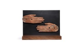 A PAIR OF EGYPTIAN HANDS FROM AN ANTHROPOID SARCOPHAGUS