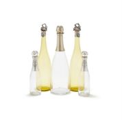 A PAIR OF VICTORIAN SILVER MOUNTED YELLOW GLASS DECANTERS