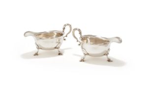 A PAIR OF GEORGE II SILVER SHAPED OVAL SAUCEBOATS
