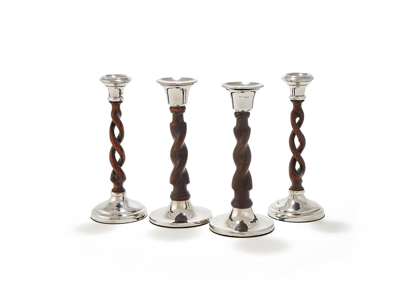 TWO PAIRS OF SILVER MOUNTED TURNED WOOD CANDLE STICKS