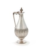 A VICTORIAN SILVER BALUSTER WATER JUG
