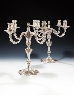 A PAIR OF SILVER FOUR LIGHT CANDELABRA