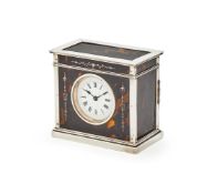 Y A SILVER AND TORTOISESHELL MOUNTED CLOCK