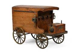 A LATE VICTORIAN OAK NOVELTY SMOKER'S CABINET IN THE FORM OF A CARRIAGE, LATE 19TH CENTURY
