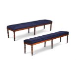 A PAIR OF GEORGE IV BROWN OAK HALL OR GALLERY SEATS, ATTRIBUTED TO GILLOWS, CIRCA 1825