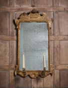 A GEORGE I GILTWOOD AND GILT GESSO GIRANDOLE MIRROR, CIRCA 1725