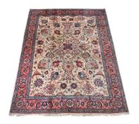 A TABRIZ CARPET, SIGNED BY MASTER WEAVER 'MORADZADEH'