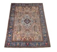 A TABRIZ CARPET, SIGNED BY MASTER WAVER 'JAVAN AMIRKHIX'