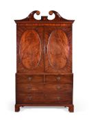 A GEORGE III MAHOGANY AND INLAID CLOTHES PRESS, AFTER DESIGNED BY GEORGE HEPPLEWHITE, CIRCA 1780