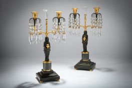 A PAIR OF REGENCY BRONZE FIGURAL TWO LIGHT CANDELABRA, EARLY 19TH CENTURY