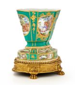 A RARE SÈVRES PORCELAIN GREEN GROUND FLOWER POT & PIERCED STAND, 1760