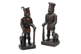 TWO GERMAN OR BAVARIAN CARVED WOOD FIGURES OF HUNTSMEN, 19TH CENTURY