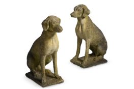 A PAIR OF COMPOSITION STONE MODELS OF DOGS, CONTEMPORARY