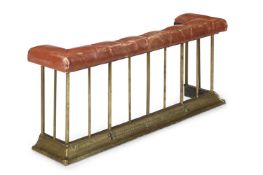 A VICTORIAN RED LEATHER AND BRASS CLUB FENDER, LATE 19TH OR EARLY 20TH CENTURY