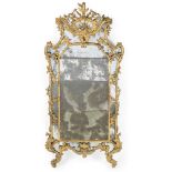 A LARGE CONTINENTAL CARVED GILTWOOD MIRROR, FIRST HALF 18TH CENTURY