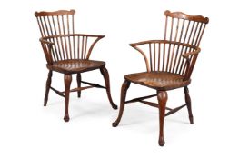 A PAIR OF ELM, YEW AND ASH COMB BACK WINDSOR CHAIRS, MID 19TH CENTURY